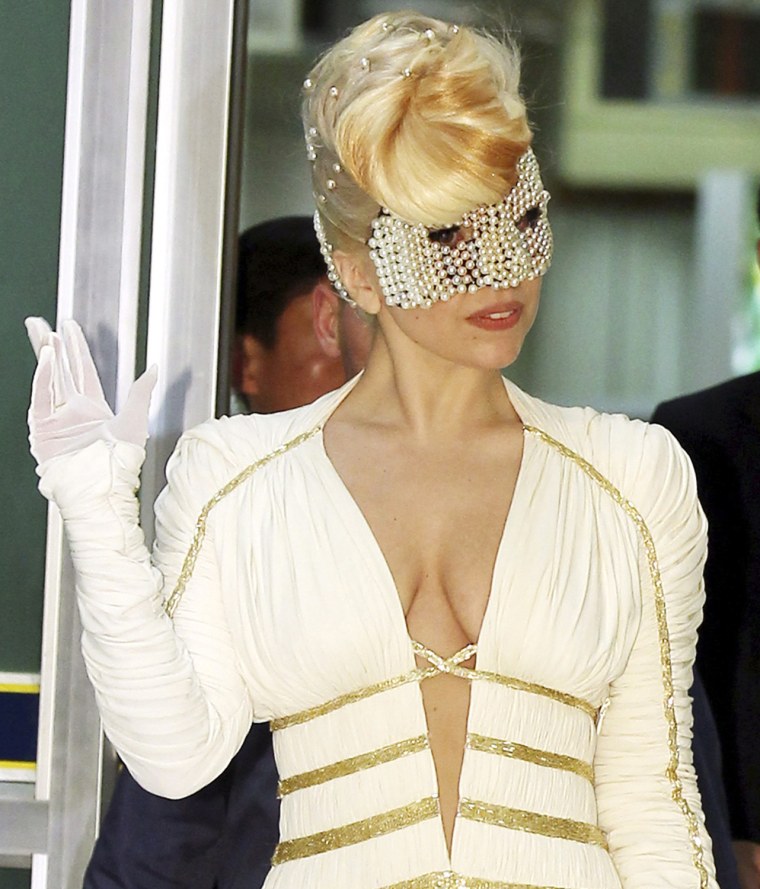 U.S. pop diva Lady Gaga waves upon her arrival in Seoul, South Korea, April 20.