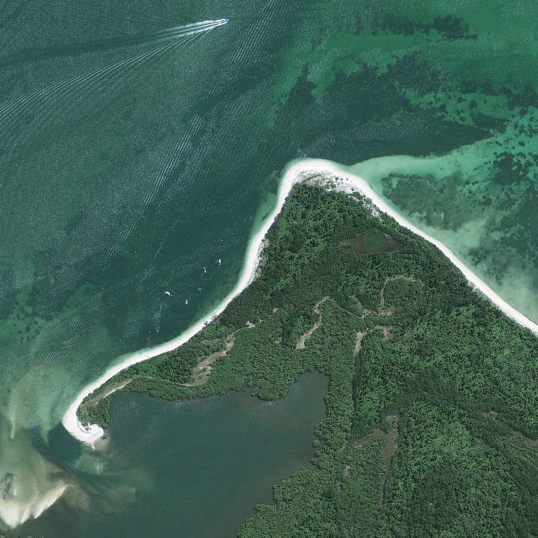 A curl of land at the tip of Australia's Towra Point Nature Reserve, located on the southern shores of Botany Bay, looks a bit like an elephant and its trunk. A boat speeds through the bay at upper left. Situated on an ancient river delta deposit, the Towra Point reserve is designated as a wetland of international importance because it is a breeding ground and home to many vulnerable, protected or endangered species with diverse habitats. There is also a Towra Point Aquatic Nature Reserve in the surrounding waterways. GeoEye tasked its GeoEye-1 satellite to collect this image on Feb. 19.