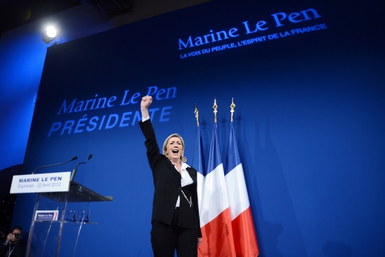 Far right Front National (FN) candidate Marine Le Pen celebrates after a strong performance gave her the highest ever score for her anti-immigrant party. She finished third.