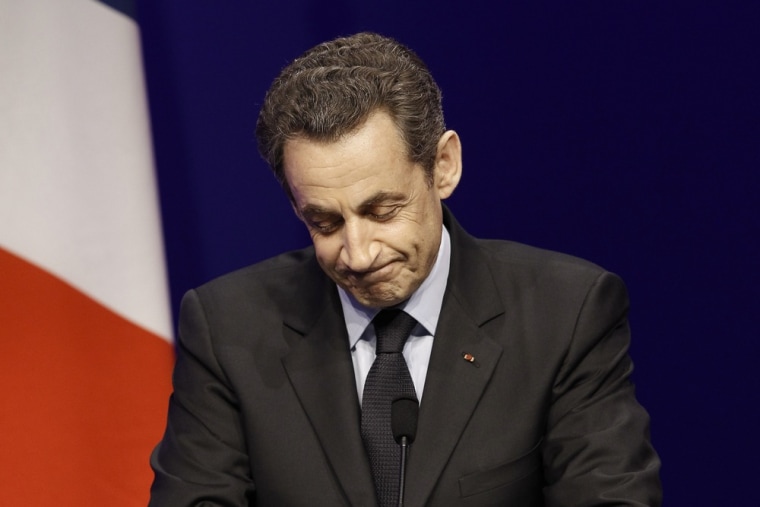 France's President and Union for a Popular Movement (UMP) candidate Nicolas Sarkozy is pictured following the announcement of the estimated results, which put him in second place.