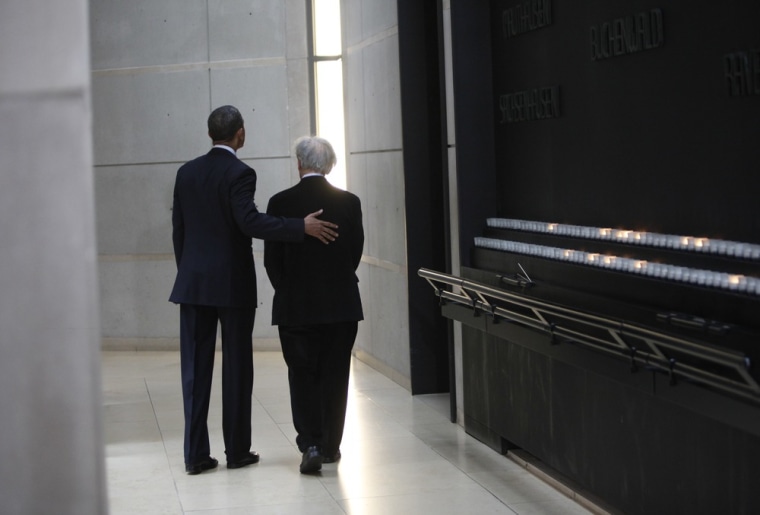 U.S. President Barack Obama and Elie Wiesel walk in the Hall of Remembrance at the Holocaust Museum April 23, 2012 in Washington, DC. Obama reportedly announced a new sanctions March 23, on Iran and Syria for entities and people using technology to target citizens.