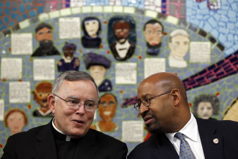 Archbishop of Philadelphia, Charles Chaput, left, and Philadelphia Mayor Michael Nutter, meet during a news conference at St. Peter the Apostle Catholic Church on April 23 in Philadelphia. Chaput signed The Great Schools Compact which is an effort to identify and replicate best practices at the city's highest-performing schools, regardless of whether they are charter or district-operated or Catholic schools.