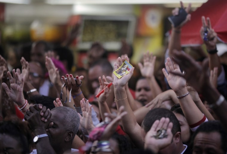 Devotees of Sao Jorge, or Saint George, attend a mass on April 23 during the celebrations of Sao Jorge's day in Rio de Janeiro, Brazil.