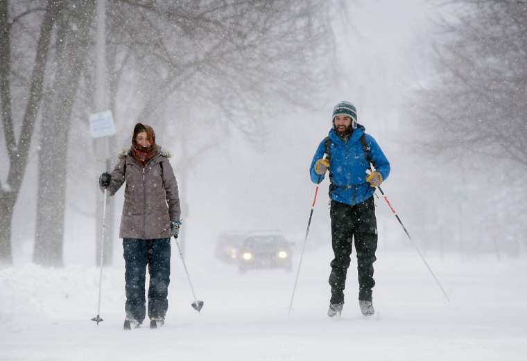 Arricka Nowland, left, and Brian Lessels cross country ski on a snow covered street during a storm on March 1 in Portland, Maine. The northeasternmost state ranked No.1 in terms of