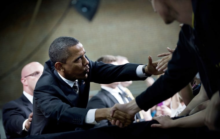 President Barack Obama shakes hands before speaking to a crowd April 24 at the University of North Carolina in Chapel Hill, N.C.