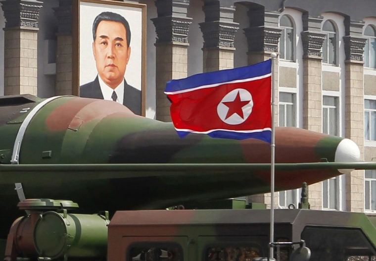 In this photo taken on April 15, 2012, what appears to be a new missile is carried during a mass military parade at the Kim Il Sung Square in Pyongyang, North Korea. The photo shows the warhead's surface is undulated, suggesting it's a thin metal sheet unable to withstand flight pressure, analysts say.