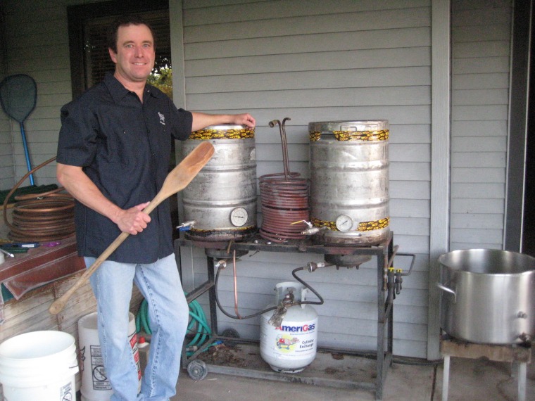Corey Martin, one of the winners of Sam Adams' LongShot competition, shows off his brewing lab.