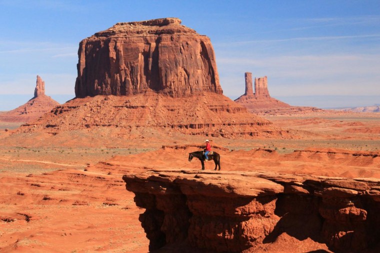 Lone rider at John Ford's Point, Monument Valley
