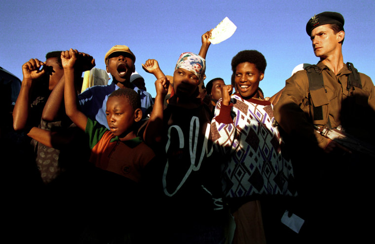 20 years ago today: Voters sing while they wait to vote in a voting station April 27, 1994 in Lindelani, in Natal Province, South Africa.