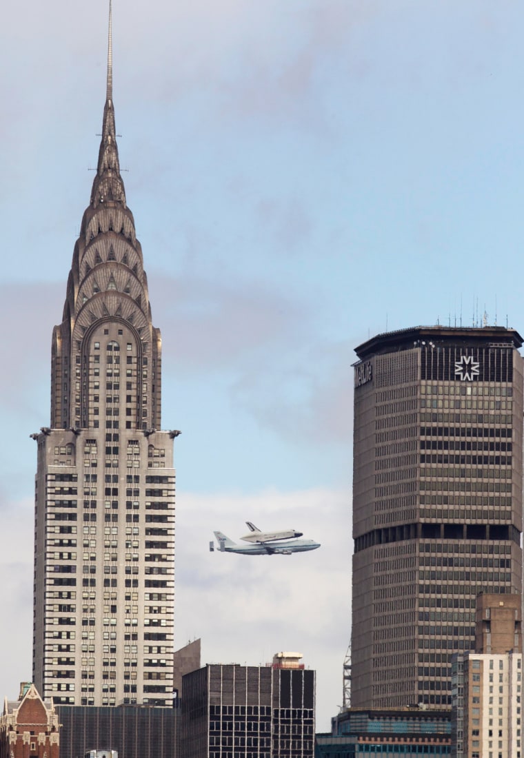 The Space Shuttle Enterprise rides atop a NASA modified 747 plane over New York on April 27. The Space Shuttle Enterprise officially arrived in New York to be placed at the Intrepid Sea, Air and Space Museum.