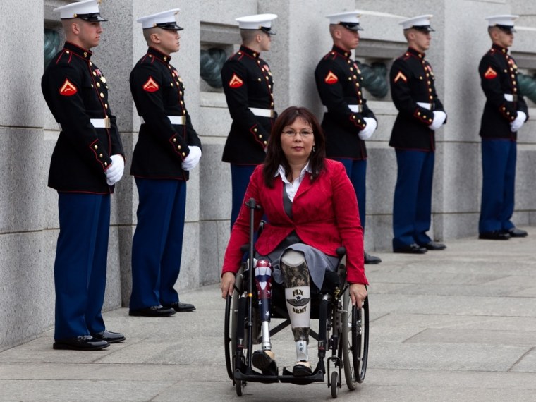 Congressional hopeful Tammy Duckworth arrives at a World War II Memorial ceremony to pay tribute to World War II veterans of the Pacific in this file photo on March 11, 2010 in Washington, DC.