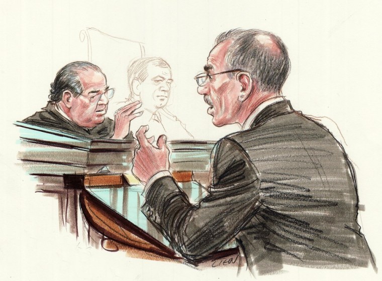 This courtroom sketch by Art Lien shows Solicitor General Donald Verrilli, right, speaking to Justice Antonin Scalia on March 26, 2012 as he argues his case before the Supreme Court in Washington, DC.
