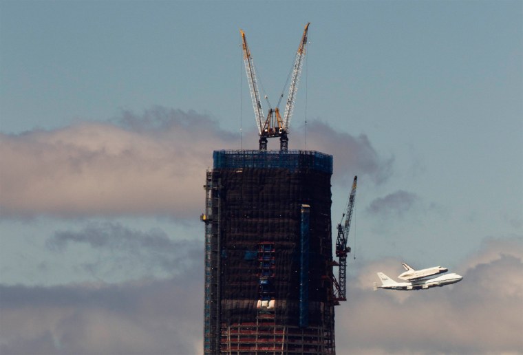 The Space Shuttle Enterprise rides atop a NASA modified 747 plane over New York on April 27. The Space Shuttle Enterprise officially arrived in New York to be placed at the Intrepid Sea, Air and Space Museum.
