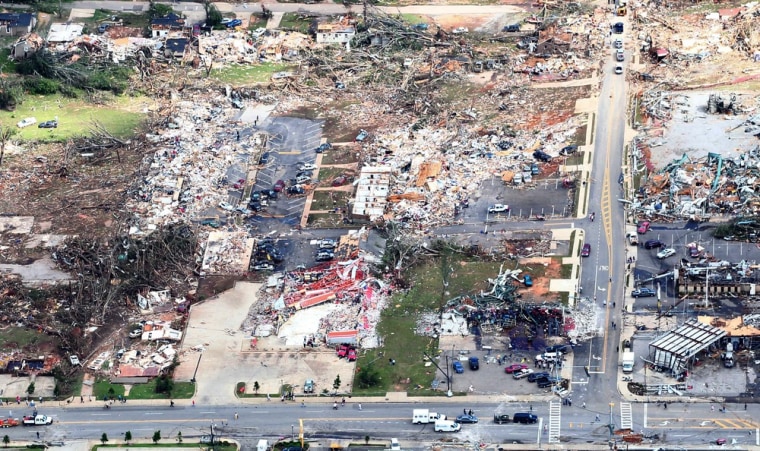 An aerial view shows extensive damage to homes and businesses in the path of tornadoes in Tuscaloosa, Alabama, on April 28.