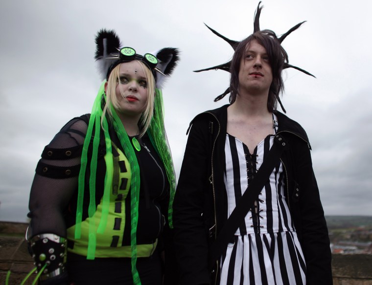 Goths stand near the abbey.