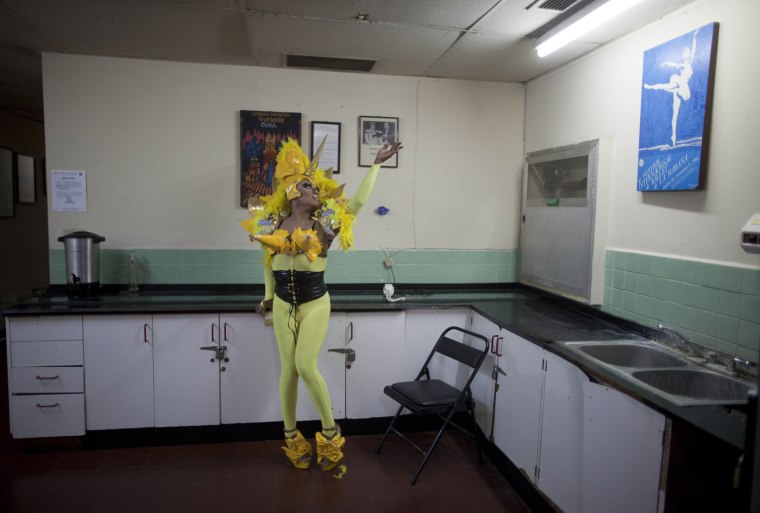 A dancer poses for a picture after performing in the 2012 Miss Gay Nicaragua beauty contest in a backstage kitchen area of the Ruben Dario National Theatre in Managua, Nicaragua, April 28.