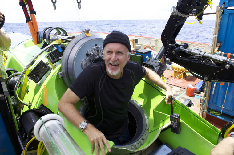 James Cameron emerges from the Deepsea Challenger submersible after his successful solo dive to the Mariana Trench, the deepest part of the ocean, on March 26.