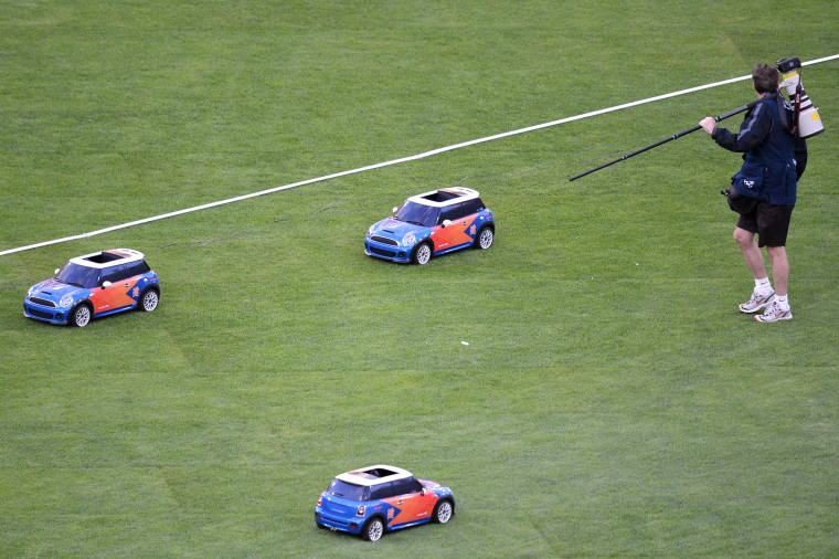 Olympic track and fielders get a big hand from Mini helpers