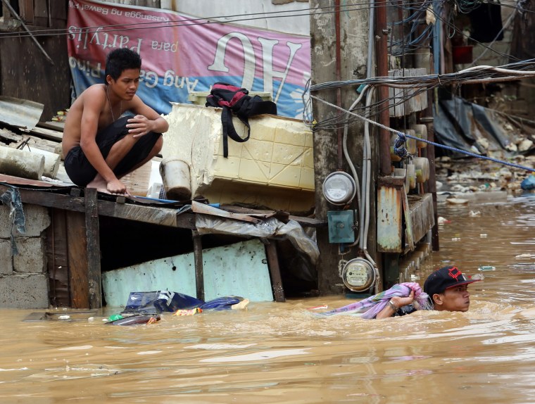 Widespread flooding continues in Manila