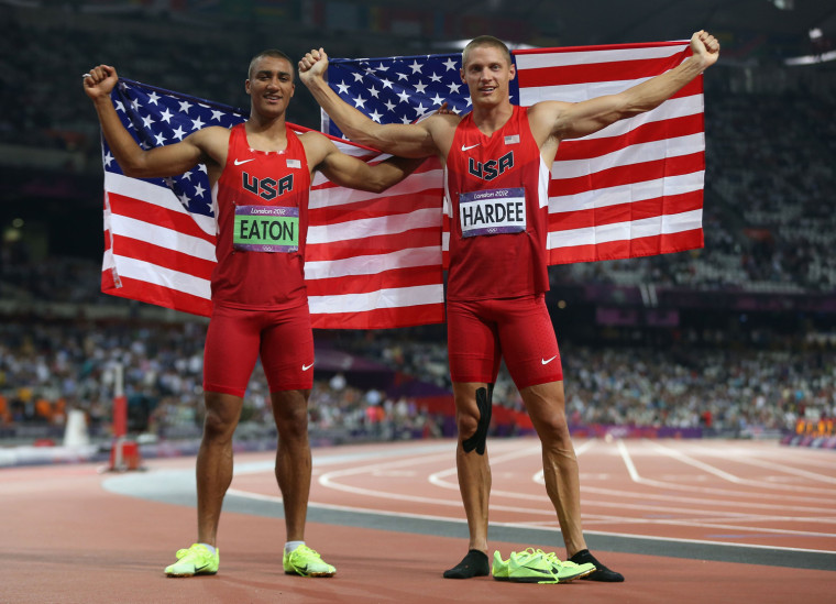 Ashton Eaton, left, and Trey Hardee of the United States, wearing (or not wearing) their distinctive yellow Nike Volt shoes, celebrate their gold and silver medals in the men's decathlon Thursday.