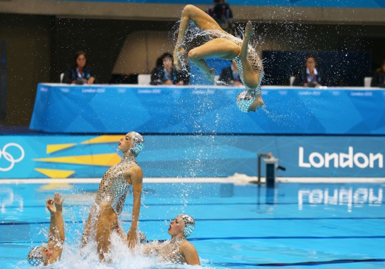 Spain competes in the Women's Teams Synchronized Swimming Free Routine final August 10.