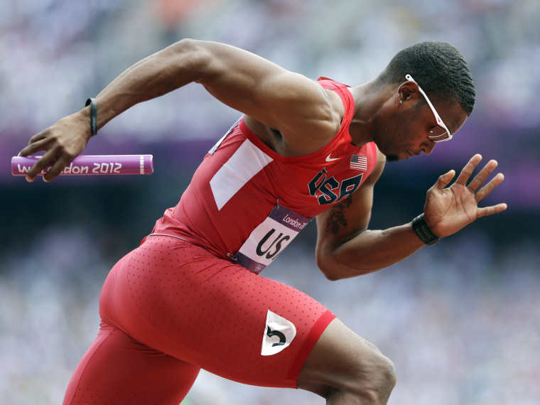 United States' Manteo Mitchell competes in a 4x400-meter relay heat during the athletics in the Olympic Stadium at the 2012 Summer Olympics, in London on Thursday. Manteo had half a lap to go in the first leg of the 4x400-meter relay preliminaries when he broke his leg, and was faced with a choice: keep running or stop and lose the race.