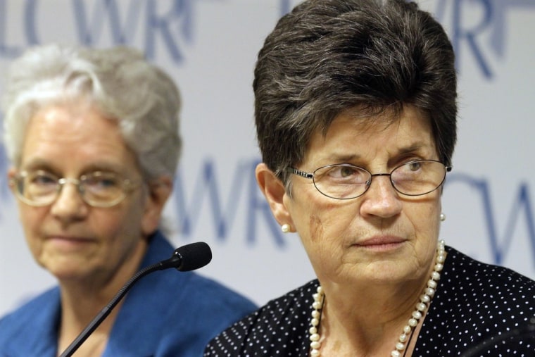 Outgoing President of The Leadership Conference of Women Religious Sister Pat Farrell, right, and president-elect Sister Florence Deacon, left, listen to questions from reporters Friday in St. Louis.