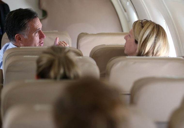 Republican presidential candidate Mitt Romney talks with senior adviser Beth Myers aboard his campaign plane before taking off Aug. 2 in Centennial, Colo.