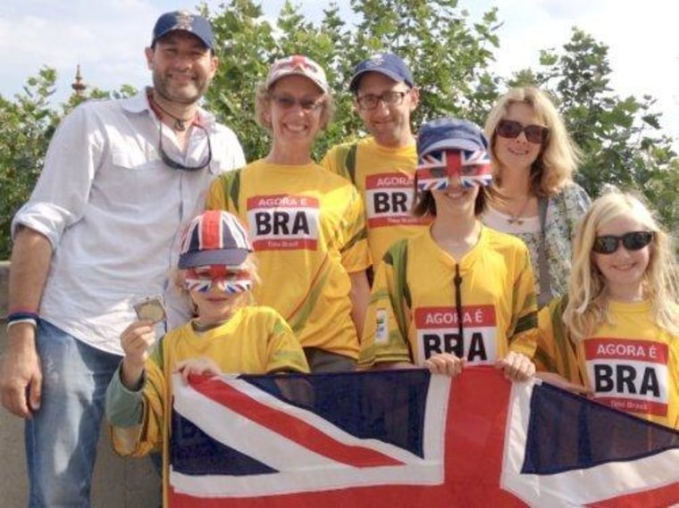 British Olympic fans look from London 2012 to Rio 2016: Richard Pope (far left) and his wife Penny (far right) at Casa Brasil in London on Sunday with Penny's brother Jim (second from right) and his wife Sue (second from left) with their children Ralph, 6, (front left) and Daisy, 8, (front, right) and their friend Kit Simmons, 10 (front center).