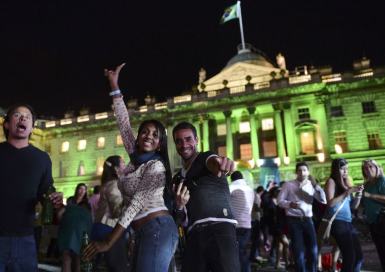 Revelers dance during a party at Casa Brazil in London on Sunday night. Rio de Janeiro will host the 2016 Summer Olympics.