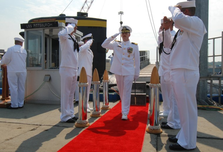 Michael Ward II, center, when he took command of USS Pittsburgh on Aug. 3.