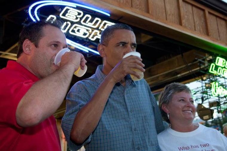 President Obama soaking up suds from a beer tent at the Iowa State Fair on Monday.