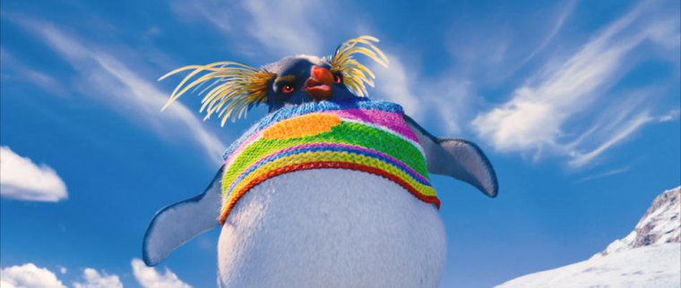 Lovelace the penguin now sports a crazy rainbow sweater in \"Happy Feet 2.\"