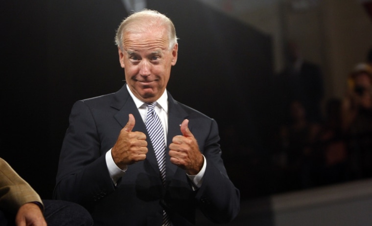 Vice President Joe Biden gives two thumbs up Monday, Aug. 13, 2012, during a rally at the Durham Armory in Durham, N.C.