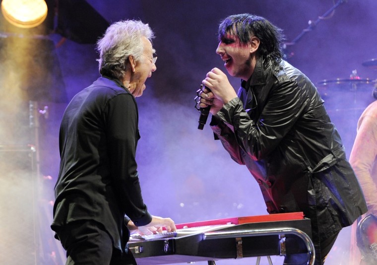Marilyn Manson, right, is joined by Ray Manzarek of The Doors during his headlining set at the Sunset Strip Music Festival on Aug. 18 in West Hollywood, Calif.