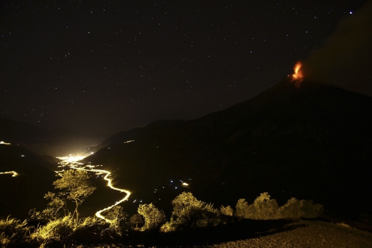 The volcano spews ash towards the nearby town of Banos on August 21, 2012.