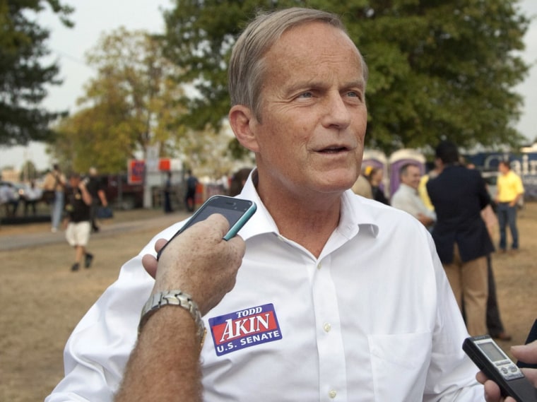 Rep. Todd Akin, R-Mo., talks with reporters while attending the Governor's Ham Breakfast at the Missouri State Fair in Sedalia, Mo.