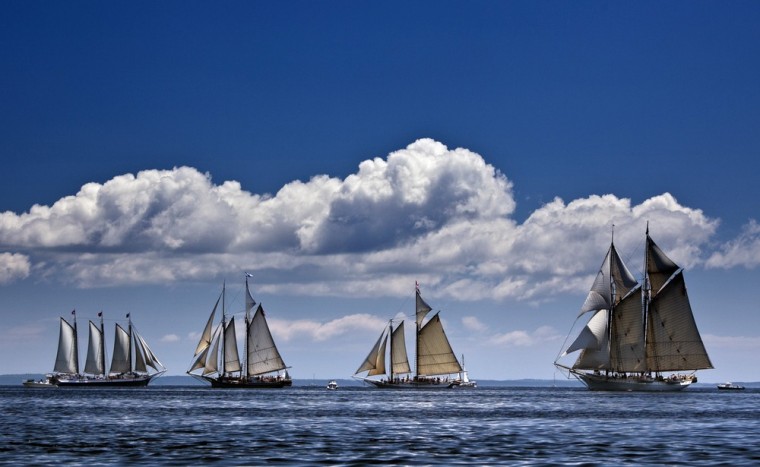 The schooner Mary Day, right, sails in a schooner race with other members of Maine's windjammer fleet off Rockland, Maine.