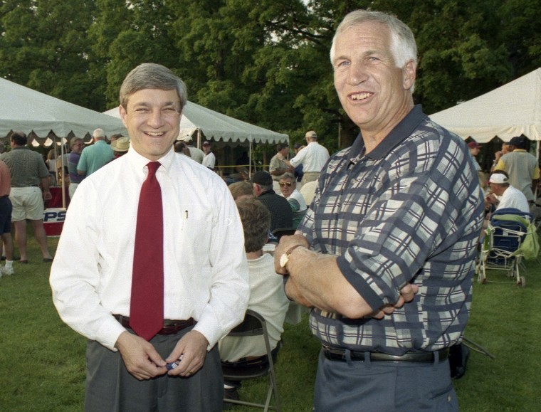 Former Penn State University President Graham Spanier, left, and former Penn State assistant football coach Jerry Sandusky, attend the Second Mile Celebrity Golf Classic, in State College, Pennsylvania, in 1997.