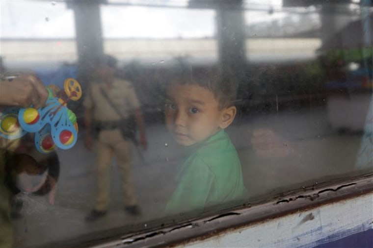 A child from India's northeastern state sits inside an air-conditioned carriage