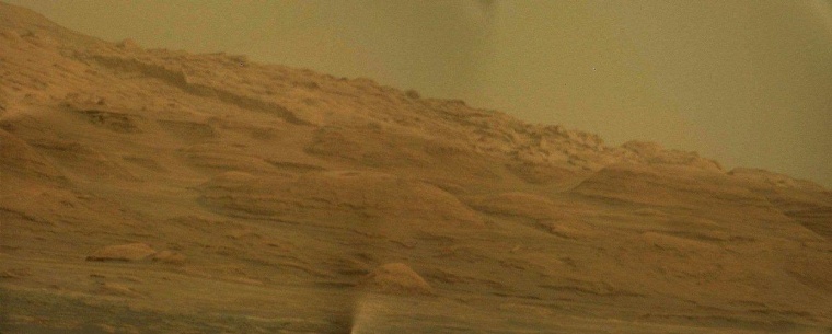 An enhanced-color version of stitched-together Mastcam imagery provides a closer look at the mesas and buttes on the flanks of Mount Sharp.