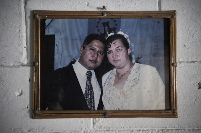 Ernesto Rosales Guillen and Sonia Vanegas Munoz appear in a wedding picture that hangs in the couple's home in El Salvador.