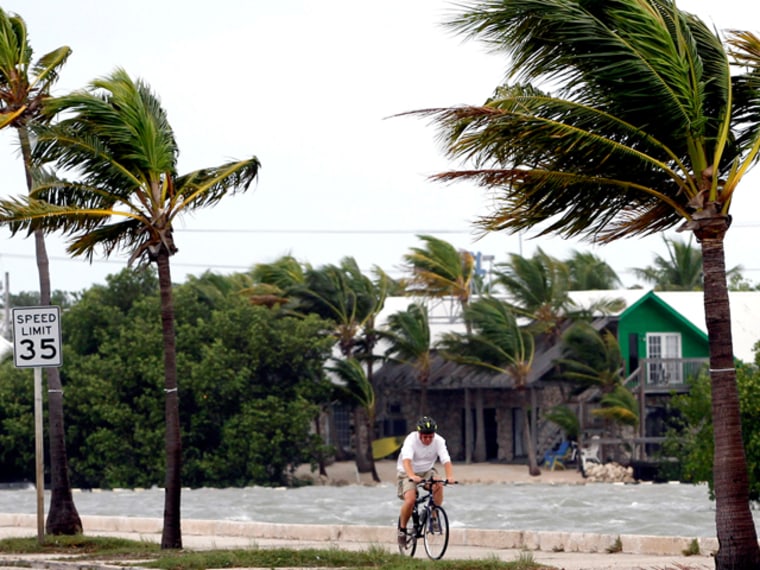 Tropical Storm Isaac rakes the Dominican Republic, Haiti and Cuba as it begins to head into the Gulf of Mexico.