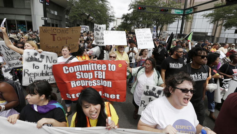 Demonstrators protest in Tampa, Fla., on Monday.