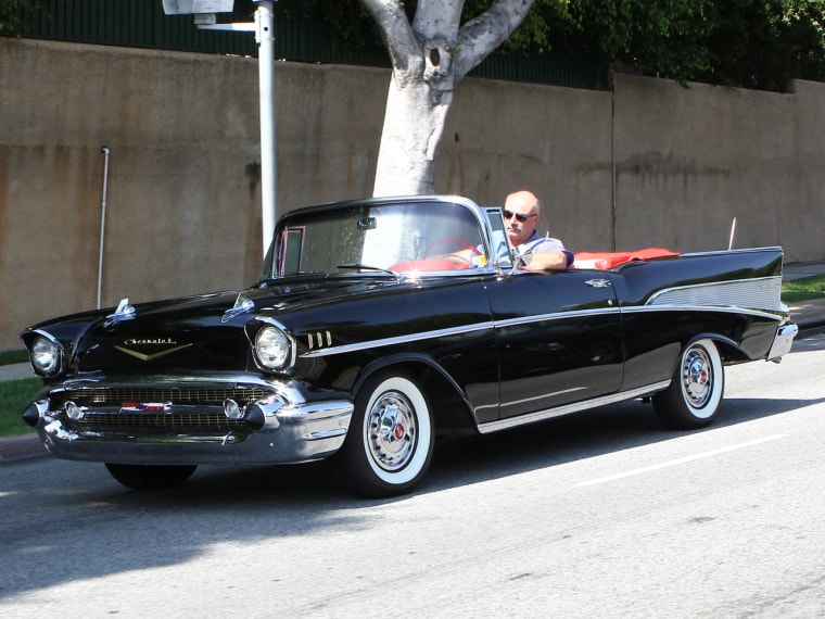 Dr. Phil was spotted with the top down on his classic '57 Chevy convertible on Aug. 3.  The car was later stolen from a repair shop.