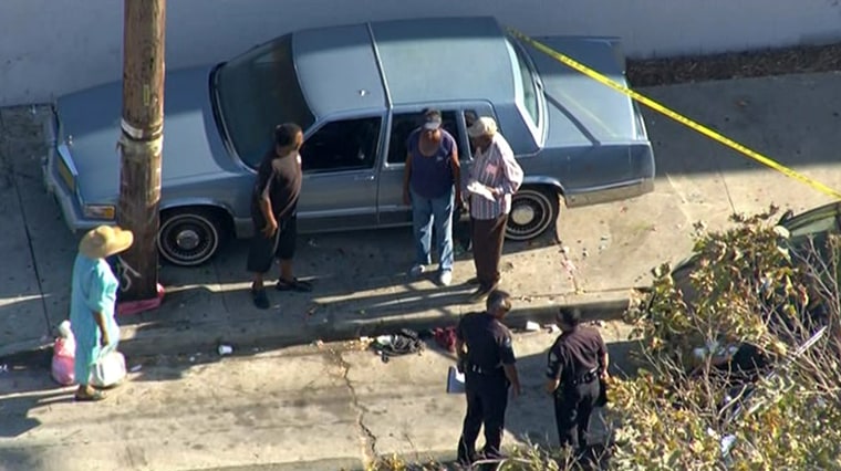 A car hopped a curb near a south Los Angeles school just after classes let out Wednesday. Several people were injured.