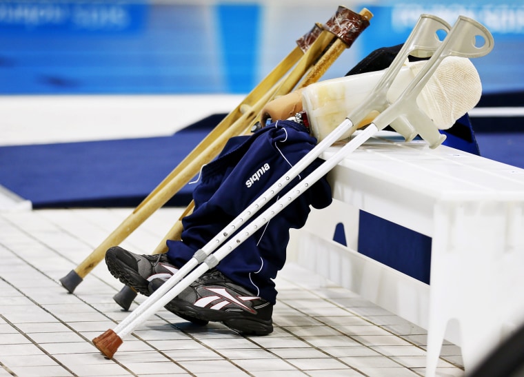 Prostheses and crutches of athletes are seen at the Aquatics Center during the swimming competitions of the London 2012 Paralympic Games in London, Britain, Aug. 30.