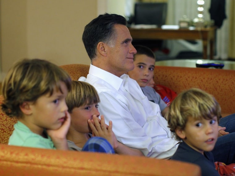 Republican presidential candidate and former Massachusetts Governor Mitt Romney watches television coverage of the Republican National Convention with five of his grandchildren in Tampa on Aug. 29.