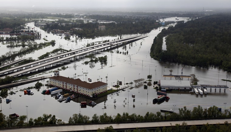 Interstate 10 lies partially submerged by floodwaters in LaPlace, La., Aug. 30, 2012.