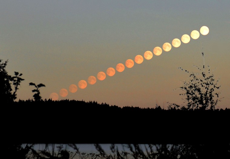 Vesa Vauhkonen created this multiple-exposure photographic view of the moon rising over Rautalampi, Finland, on Aug. 30.